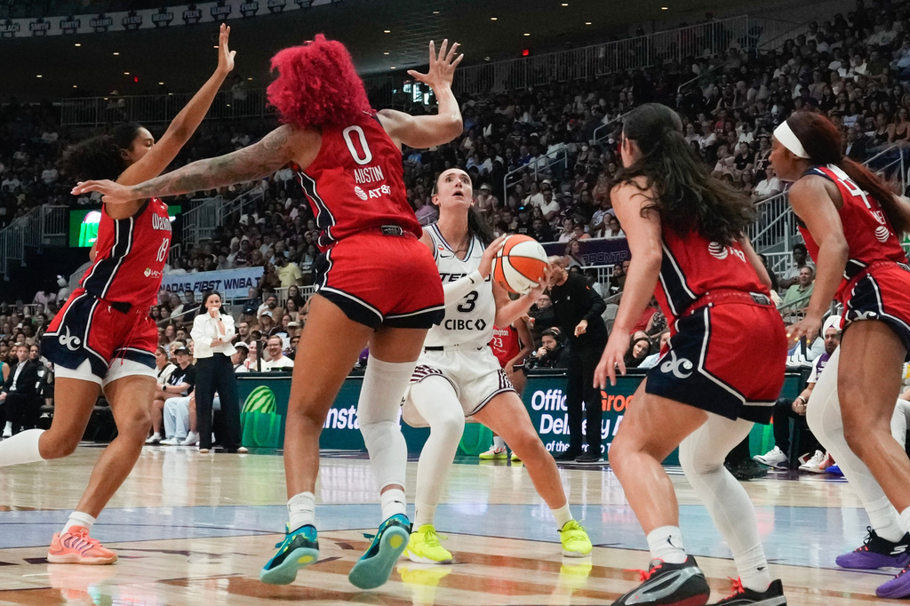 Toronto Tempo's Marina Mabrey (3) looks to shoot on the Washington Mystics defence during the first half of a WNBA basketball game in Toronto on Tuesday, July 14, 2026. (Chris Young/The Canadian Press via AP)