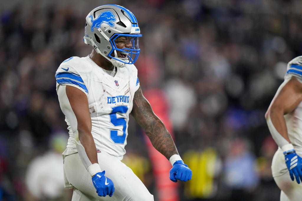 Detroit Lions running back David Montgomery celebrates a touchdown against the Baltimore Ravens during the second half of an NFL football game Monday, Sept. 22, 2025, in Baltimore. (AP Photo/Stephanie Scarbrough)