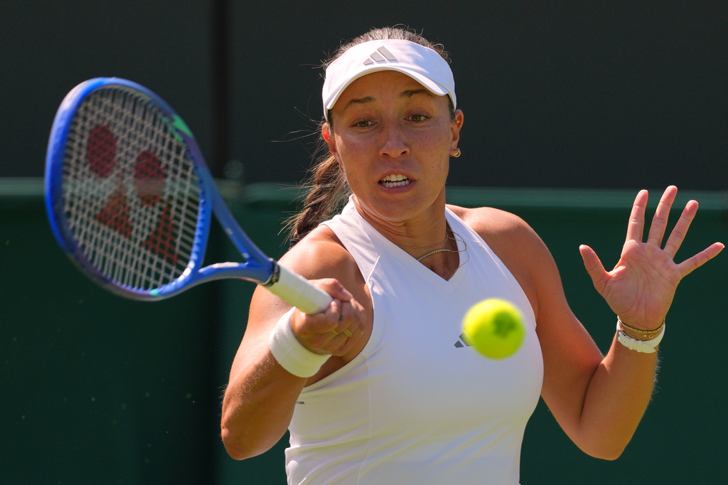 Jessica Pegula of the United States returns to Darja Vidmanova of Czech Republic during the women's singles match at the Wimbledon Tennis Championships in London, Monday, June 29, 2026.(AP Photo/Kirsty Wigglesworth)