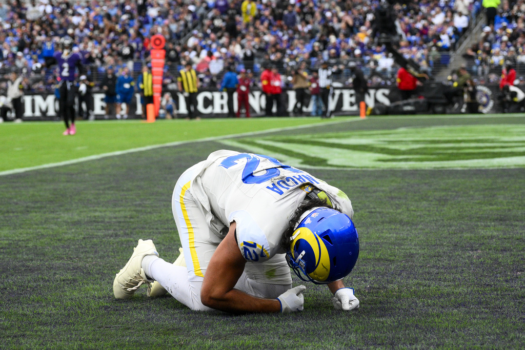 Los Angeles Rams wide receiver Puka Nacua reacts after a play against the Baltimore Ravens during the first half of an NFL football game Sunday, Oct. 12, 2025, in Baltimore. (AP Photo/Nick Wass)