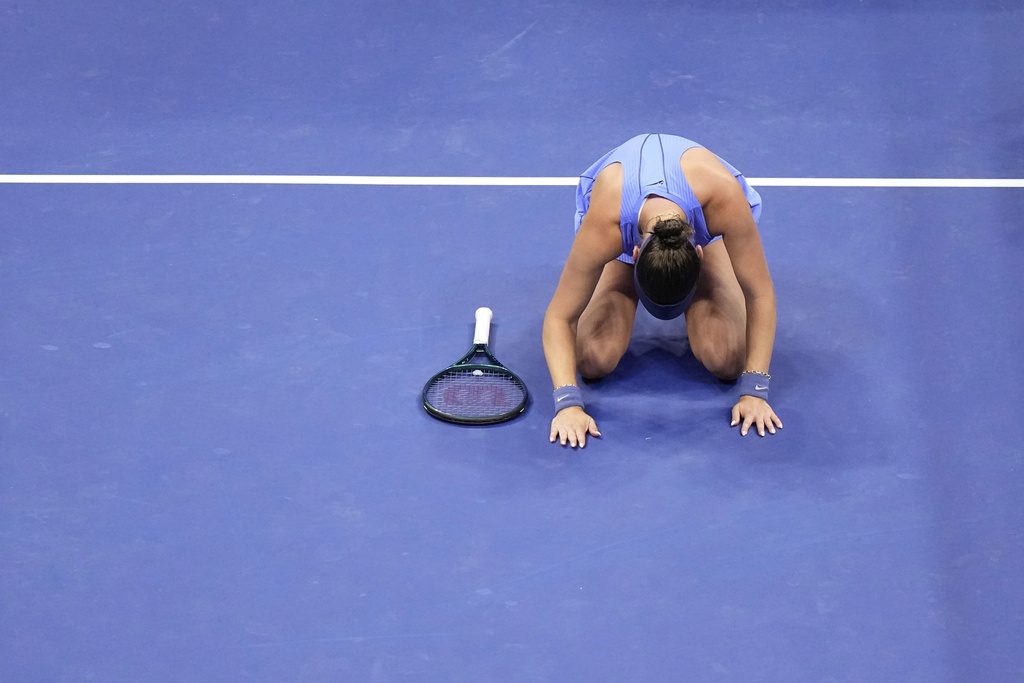 Amanda Anisimova, of the United States, reacts after defeating Naomi Osaka, of Japan, during the women's singles semifinals of the U.S. Open tennis championships, Friday, Sept. 5, 2025, in New York. (AP Photo/Frank Franklin II)
