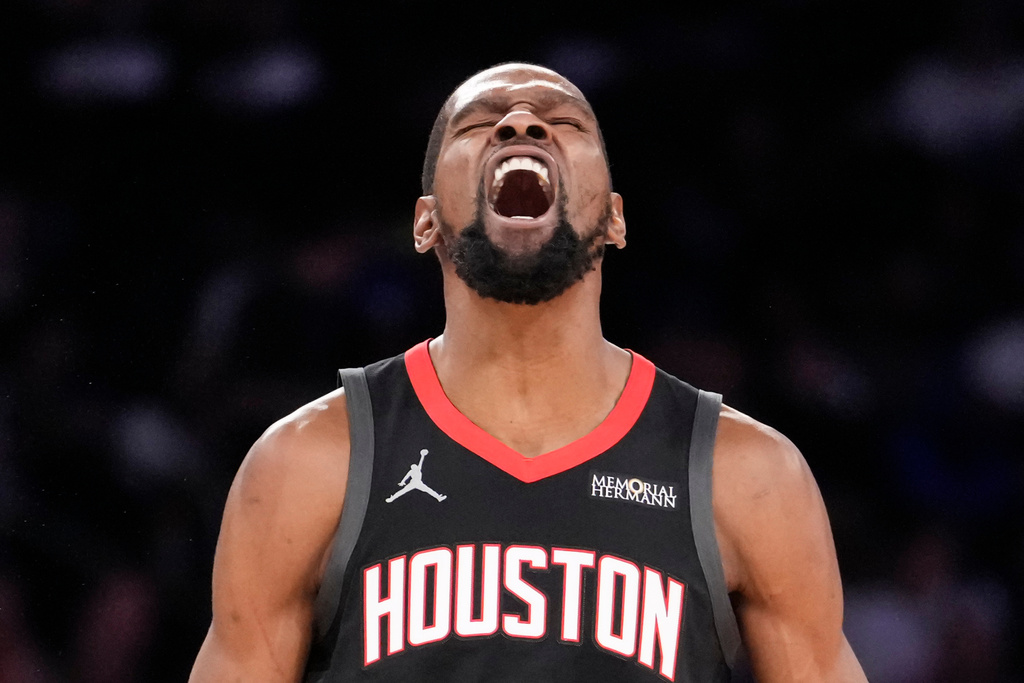 Houston Rockets forward Kevin Durant (7) reacts after scoring a 3-point goal during the second half of an NBA basketball game, Saturday, Feb. 21, 2026, in New York. (AP Photo/Yuki Iwamura)