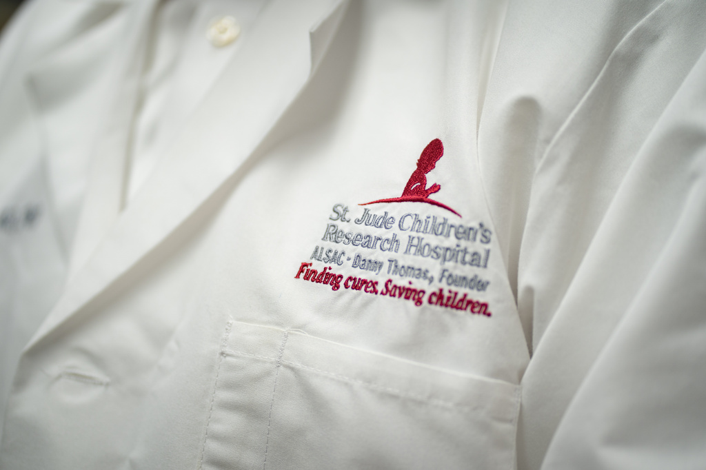 St. Jude Children's Medical Research Center CEO Dr. Charles Roberts' lab coat is seen on Monday, Aug. 17, 2026, in the Danny Thomas Research Center in Memphis, Tenn. (AP Photo/Kevin Wurm)