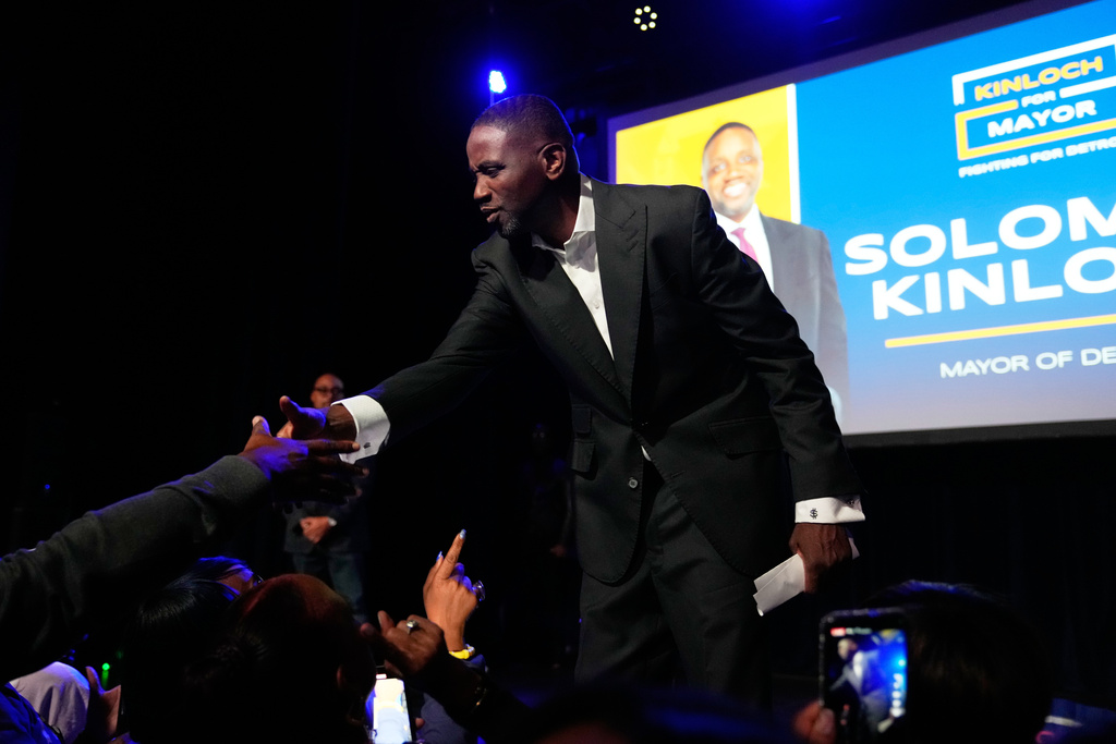 Detroit mayoral candidate Solomon Kinloch shakes hands with attendees during an election night watch party on Tuesday, Nov. 4, 2025, in Detroit. (AP Photo/Ryan Sun)