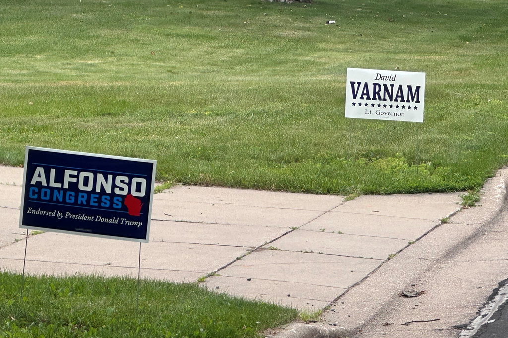 A campaign sign for Michael Alfonso, son-in-law of U.S. Department of Transportation Secretary Sean Duffy, is displayed in the yard of a home in Wausau, Wis., on Thursday, June 25, 2026. (AP Photo/Scott Bauer)