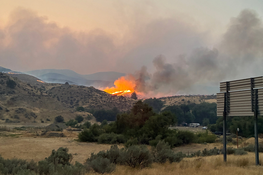 This undated photo provided by the Oregon Department of Transportation on Monday, July 27, 2026, shows the Fox Fire burning in eastern Oregon. (Oregon Department of Transportation via AP)