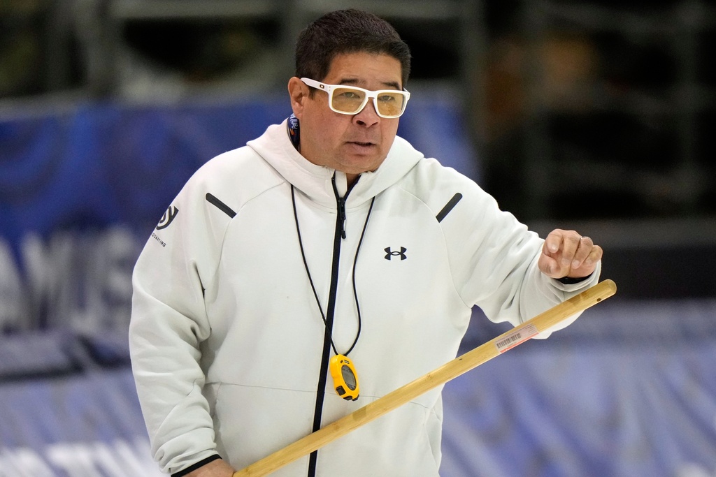 U.S. speedskating national coach Ryan Shimabukuro is seen at the U.S. Olympic trials for long track speed skating at the Pettit National Ice Center, Jan. 4, 2026, in Milwaukee. (AP Photo/Morry Gash)