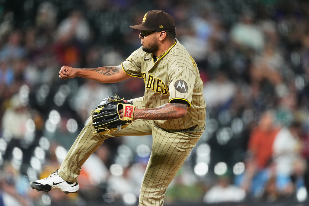 San Diego Padres relief pitcher Bradgley Rodriguez works against the Colorado Rockies in the sixth inning of a baseball game Monday, Sept. 14, 2026, in Denver. (AP Photo/David Zalubowski)