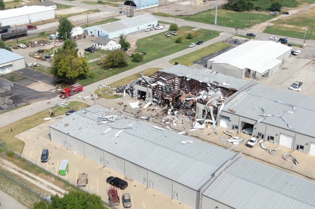In this image taken from video provided by KFOR, authorities work the scene of a building explosion in Sand Springs, Okla., Thursday, Aug. 27, 2026. (KFOR via AP)