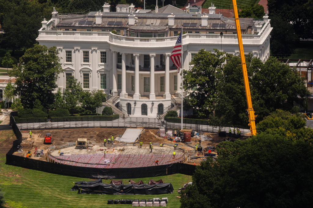 FILE - Construction continues on a helipad on the South Lawn of the White House, Wednesday, Aug. 5, 2026, in Washington. (AP Photo/Tierney L. Cross, File)