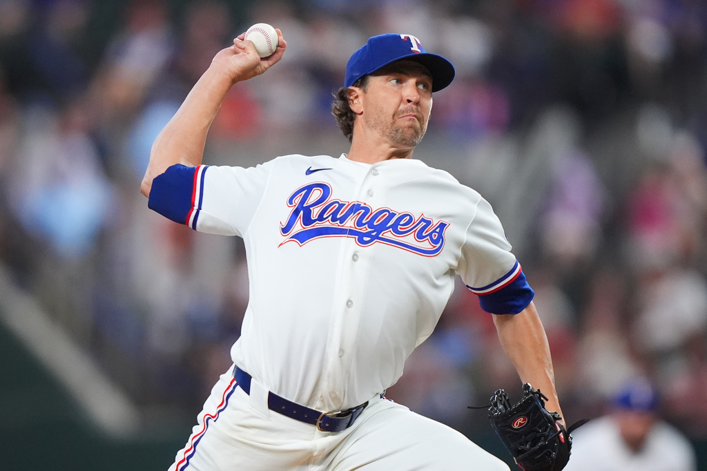Texas Rangers starting pitcher Jacob Degrom throws during the first inning of a baseball game against the against the Chicago White Sox, Monday, July 20, 2026, in Arlington, Texas. (AP Photo/LM Otero)