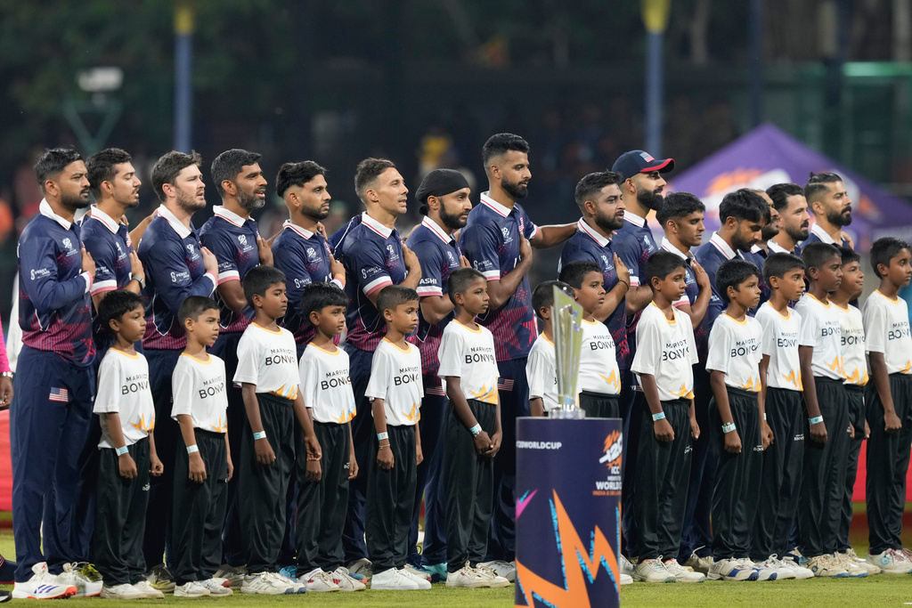 United States players stand for national anthem before the start of the T20 World Cup cricket match between Pakistan and the United States in Colombo, Sri Lanka, Tuesday, Feb. 10, 2026. (AP Photo/Eranga Jayawardena)