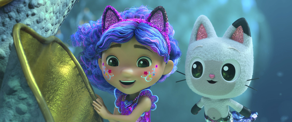 This image released by Universal Pictures shows Gabby, voiced by Laila Lockhart Kraner, left, and Pandy Paws, voiced by Logan Bailey, in a scene from DreamWorks Animation's "Gabby's Dollhouse: The Movie." (Universal Pictures/DreamWorks Animation via AP)