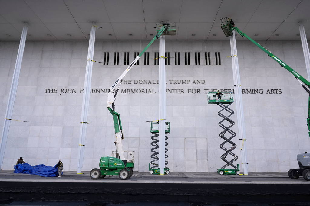 FILE - New signage, The Donald J. Trump and The John F. Kennedy Memorial Center for the Performing Arts, is unveiled on the Kennedy Center, Dec. 19, 2025, in Washington. (AP Photo/Jacquelyn Martin, file)
