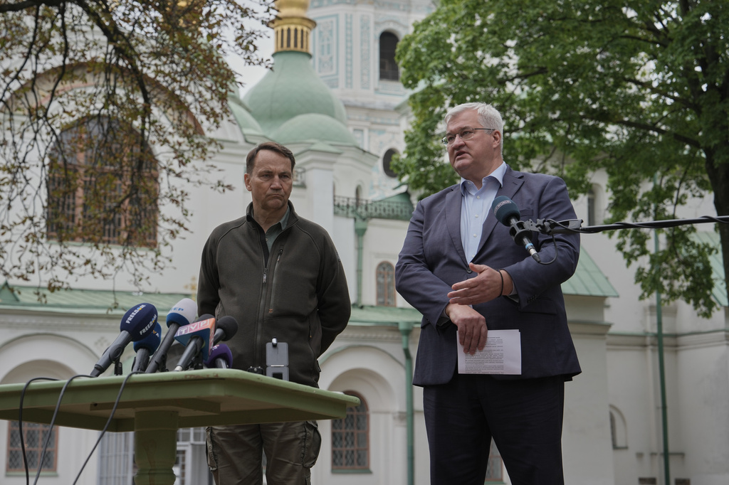 Ukrainian Foreign Minister Andrii Sybiha, right, speaks during a joint news conference with Poland's Foreign Minister Radoslaw Sikorski in Kyiv, Ukraine, Sunday, Sept. 13, 2026. (AP Photo)