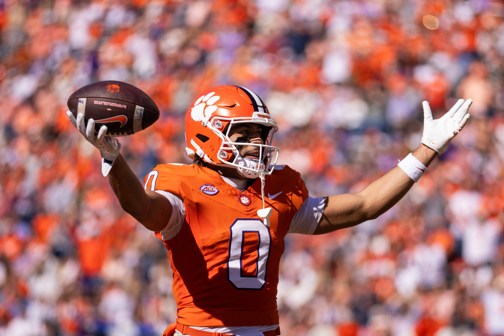 Clemson wide receiver Antonio Williams (0) celebrates after a touchdown against Duke in the first half of an NCAA college football game, Saturday, Nov. 1, 2025, in Clemson, S.C. (AP Photo/Scott Kinser)