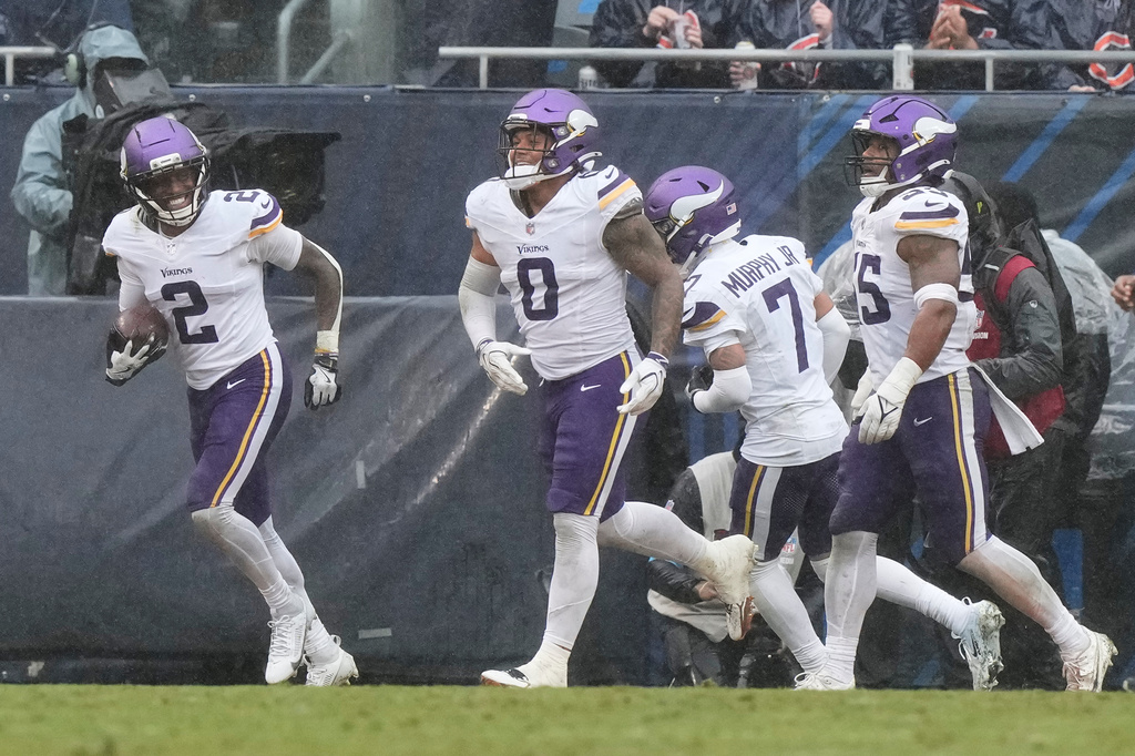 Minnesota Vikings cornerback Isaiah Rodgers (2) smiles after recovering a fumble by the Chicago Bears during the second half of an NFL football game in Chicago, Sunday, Sept. 20, 2026. (AP Photo/Nam Y. Huh)