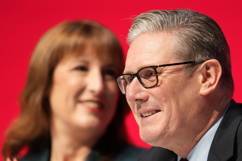 Britain's prime Minister Keir Starmer sits next to his Chancellor of the Exchequer Rachel Reeves during the annual Labour Party conference in Liverpool, England, Monday, Sept. 29, 2025. (AP Photo/Jon Super)