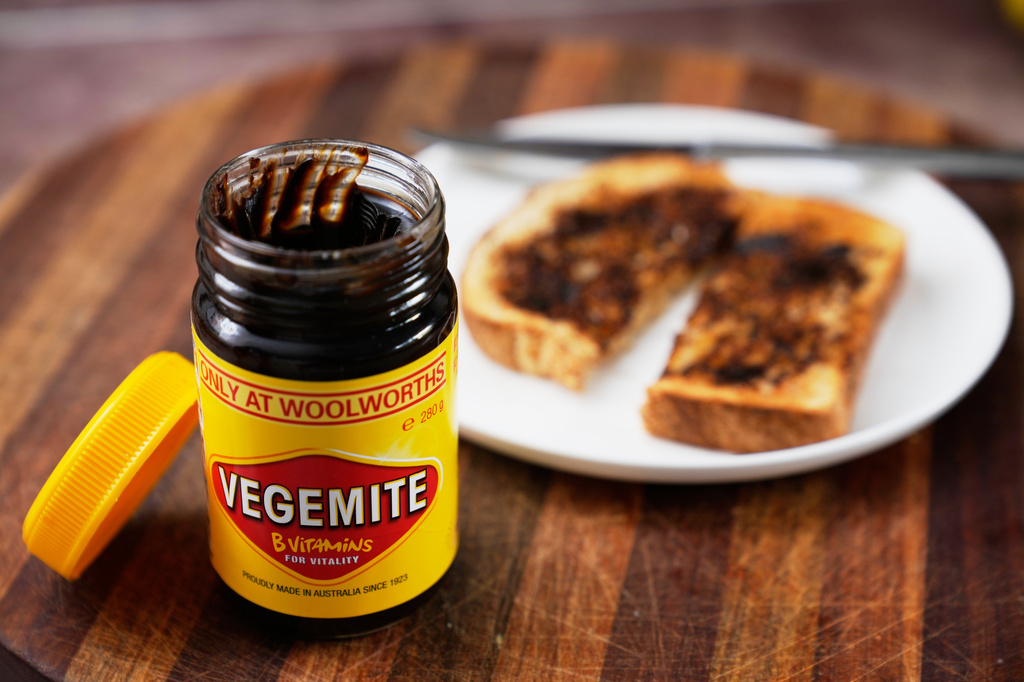 FILE - A piece of toast is prepared with Vegemite in Sydney, Australia, Monday, Nov. 17, 2025. (AP Photo/Rick Rycroft, file)