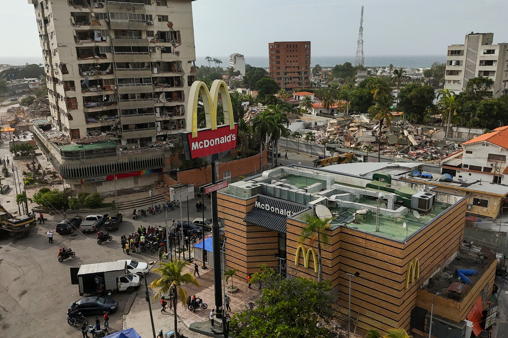 A McDonald's restaurant is being used as a temporary health center and pet reunification center after the earthquakes that struck La Guaira, Venezuela, Thursday, July 2, 2026. (AP Photo/Matias Delacroix)