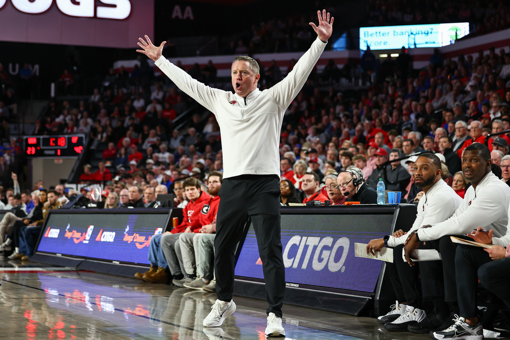 Georgia head coach Mike White reacts during the first half of an NCAA college basketball game against Florida, Wednesday, Feb. 11, 2026, in Athens, Ga. (AP Photo/Colin Hubbard)