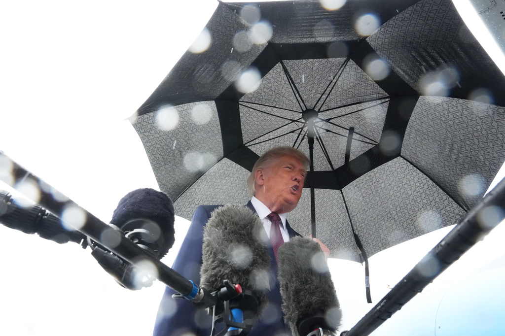 President Donald Trump speaks to the media after disembarking Air Force One at Reading Regional Airport, Tuesday, June 23, 2026, in Reading, Pa. (AP Photo/Julia Demaree Nikhinson)