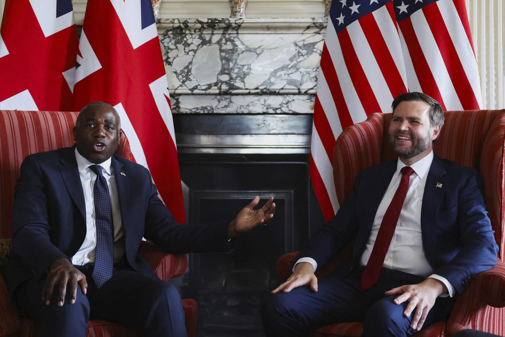 Britain's Foreign Secretary David Lammy, left, and US Vice President JD Vance during a meeting at Chevening House in Kent, England, Friday, Aug. 8, 2025. (Suzanne Plunkett/Pool via AP)