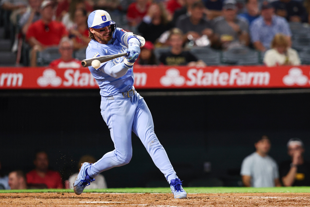 Kansas City Royals' Bobby Witt Jr. hits a single during the fourth inning of a baseball game against the Los Angeles Angels, Wednesday, Sept. 24, 2025, in Anaheim, Calif. (AP Photo/Jessie Alcheh)