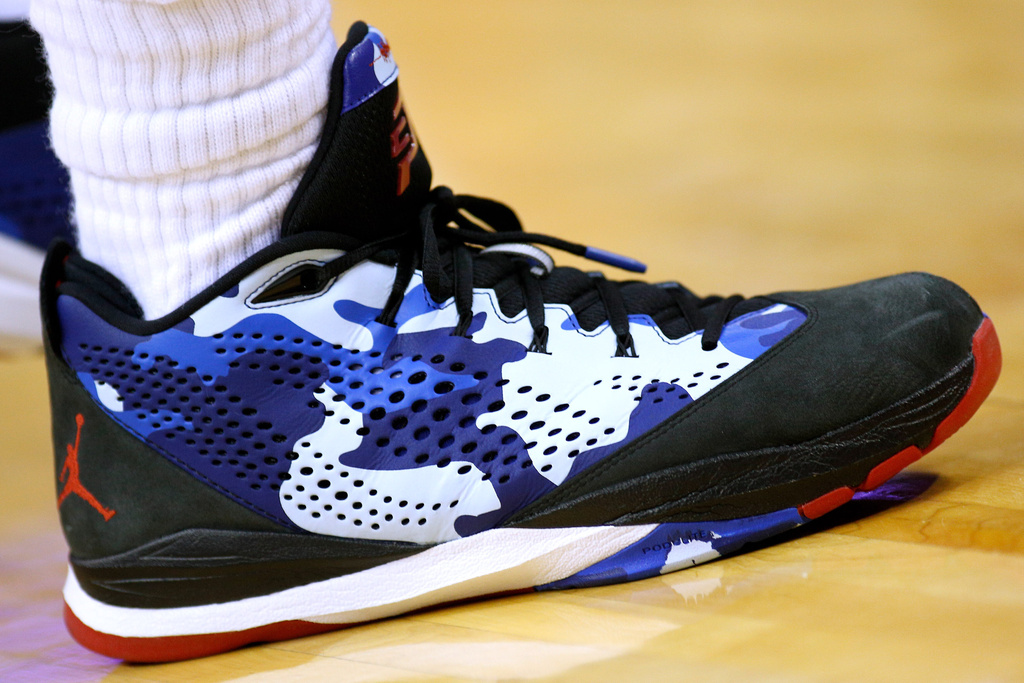 FILE - Los Angeles Clippers guard Chris Paul's shoes are seen during the second half of an NBA basketball game in New Orleans, Wednesday, March 26, 2014. (AP Photo/Jonathan Bachman, File)