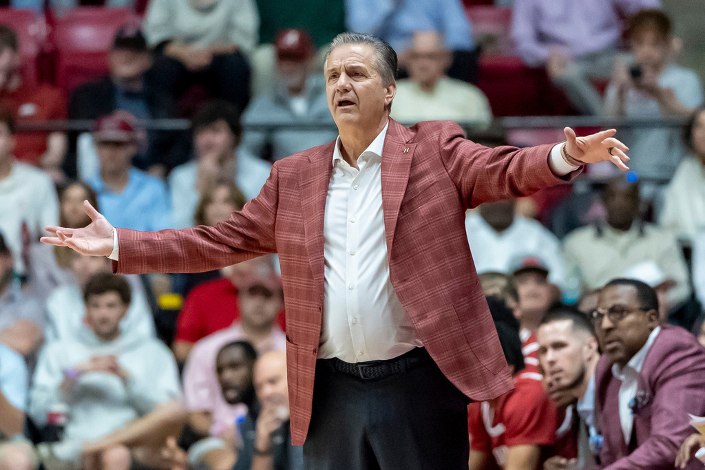 Arkansas head coach John Calipari reacts to play during the first half of an NCAA college basketball game against Alabama Wednesday, Feb. 18, 2026, in Tuscaloosa, Ala. (AP Photo/Vasha Hunt)