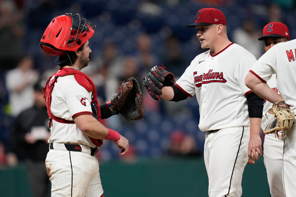 Cleveland Guardians pitcher Parker Messick, right, bumps gloves with catcher Austin Hedges, left, as he is taken out of the game in the ninth inning of a baseball game against tghe Baltimore Orioles in Cleveland, Thursday, April 16, 2026. (AP Photo/Sue Ogrocki)