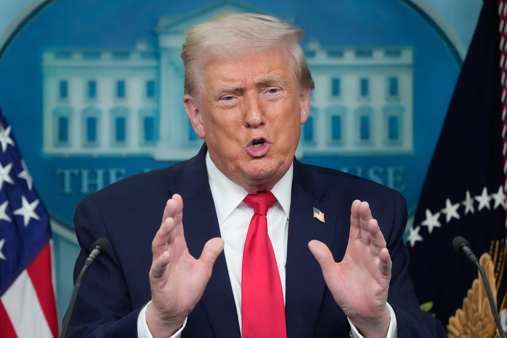 President Donald Trump speaks during a press briefing at the White House in Washington, Tuesday, Jan. 20, 2026. (AP Photo/Mark Schiefelbein)