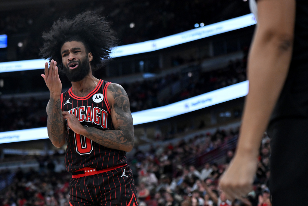 Chicago Bulls' Coby White yells at a referee during the second half of an NBA basketball game against the New Orleans Pelicans, Sunday, Dec. 14, 2025, in Chicago. (AP Photo/Paul Beaty)
