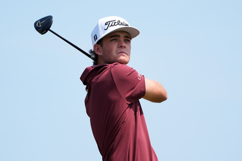 Jackson Koivun hits from the sixth tee during the first round of the 3M Open golf tournament at the Tournament Players Club Thursday, July 23, 2026, in Blaine, Minn. (AP Photo/Bruce Kluckhohn)