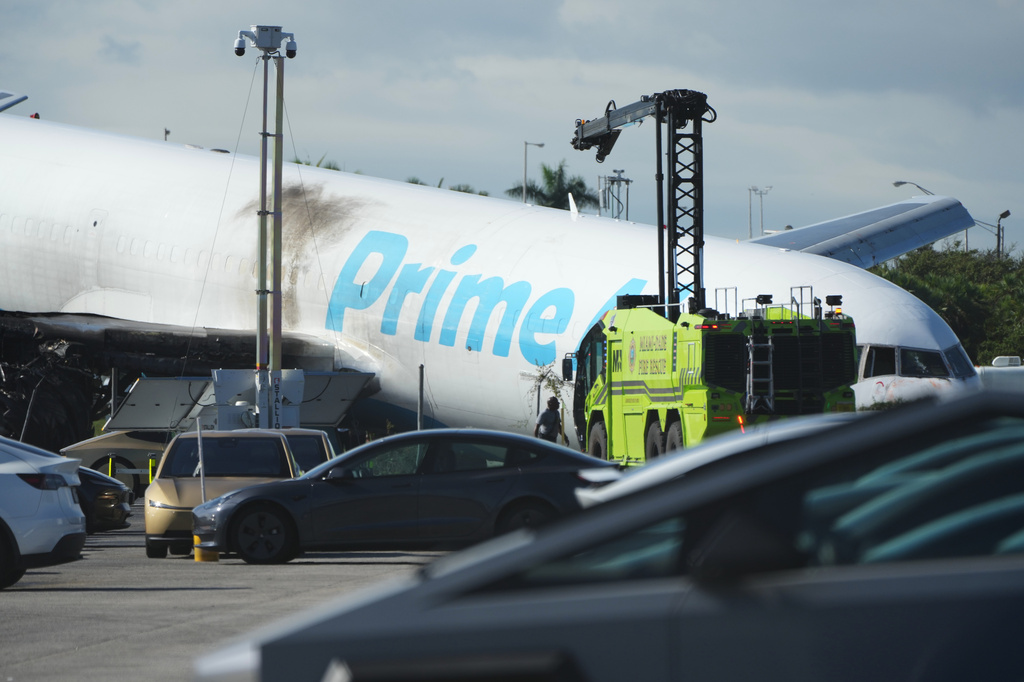 An Amazon cargo plane sits at the Miami International Airport (MIA) Monday, Sept. 7, 2026, after it overshot the runway on Sunday, in Miami. (AP Photo/Lynne Sladky)