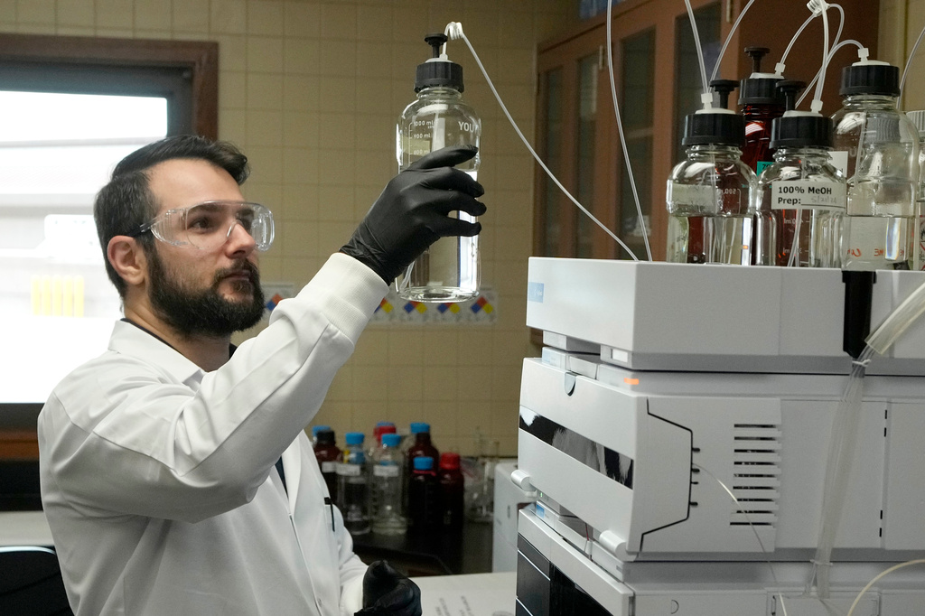 Michael Serpa, senior scientist at the Scottsdale Water Campus, works on water testing, Wednesday, Sept. 9, 2026, in Scottsdale, Ariz. (AP Photo/Ross D. Franklin)
