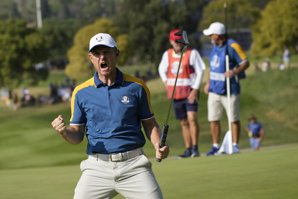 FILE - Europe's Justin Rose celebrates on the 15th green during his singles match at the Ryder Cup golf tournament at the Marco Simone Golf Club in Guidonia Montecelio, Italy, Sunday, Oct. 1, 2023. (AP Photo/Alessandra Tarantino)