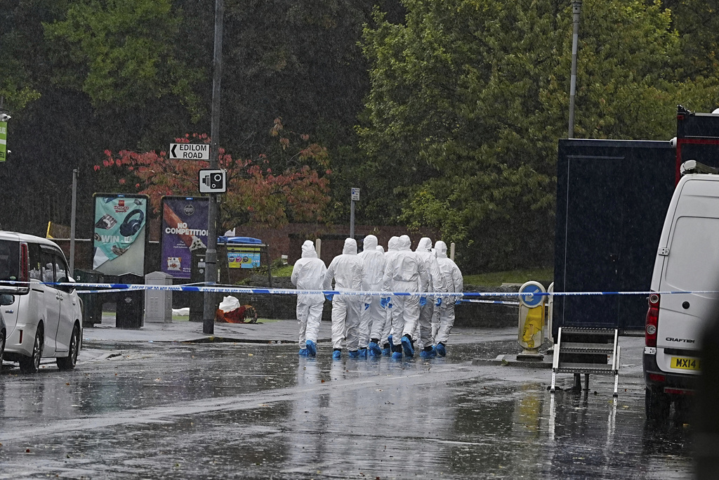Police officers attend the scene of attack at Heaton Park Hebrew Congregation synagogue in Crumpsall, Manchester, England, Saturday Oct. 4, 2025. (Peter Byrne/PA via AP)