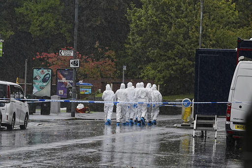 Police officers attend the scene of attack at Heaton Park Hebrew Congregation synagogue in Crumpsall, Manchester, England, Saturday Oct. 4, 2025. (Peter Byrne/PA via AP) Police officers attend the scene of attack at Heaton Park Hebrew Congregation synagogue in Crumpsall, Manchester, England, Saturday Oct. 4, 2025. (Peter Byrne/PA via AP)
