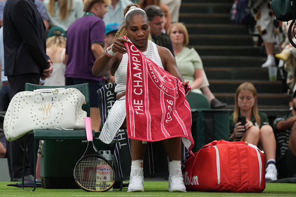 Serena Williams of the United States sits during a changeover in her first round women's singles match against Maya Joint of Australia, at the Wimbledon Tennis Championships in London, Tuesday, June 30, 2026. (AP Photo/Maja Smiejkowska)