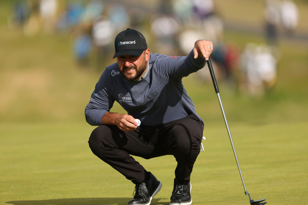 FILE - Stephan Jaeger, of Germany, looks at his putt on the first green during the first round of the British Open golf championship at the Royal Portrush Golf Club, Northern Ireland, July 17, 2025. (AP Photo/Peter Morrison, File)