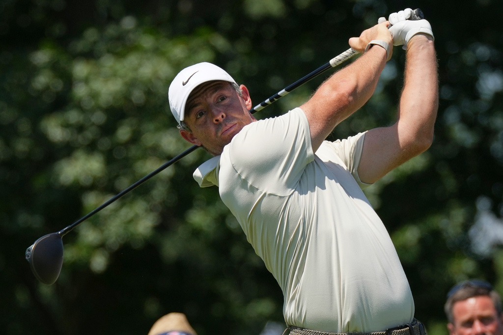 Rory McIlroy, of Northern Ireland, hits from the fifth tee during the first round of the BMW Championship golf tournament Thursday, Aug. 20, 2026, in St. Louis. (AP Photo/Jeff Roberson)