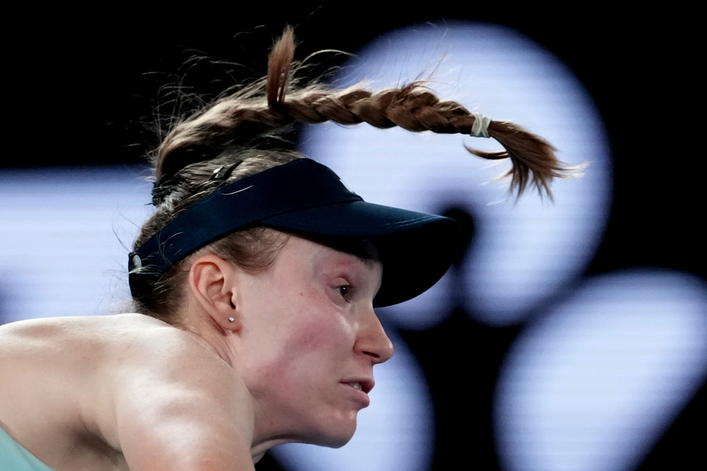 Elena Rybakina of Kazakhstan serves to Jessica Pegula of the U.S. during their semifinal match at the Australian Open tennis championship in Melbourne, Australia, Thursday, Jan. 29, 2026. (AP Photo/Aaron Favila)