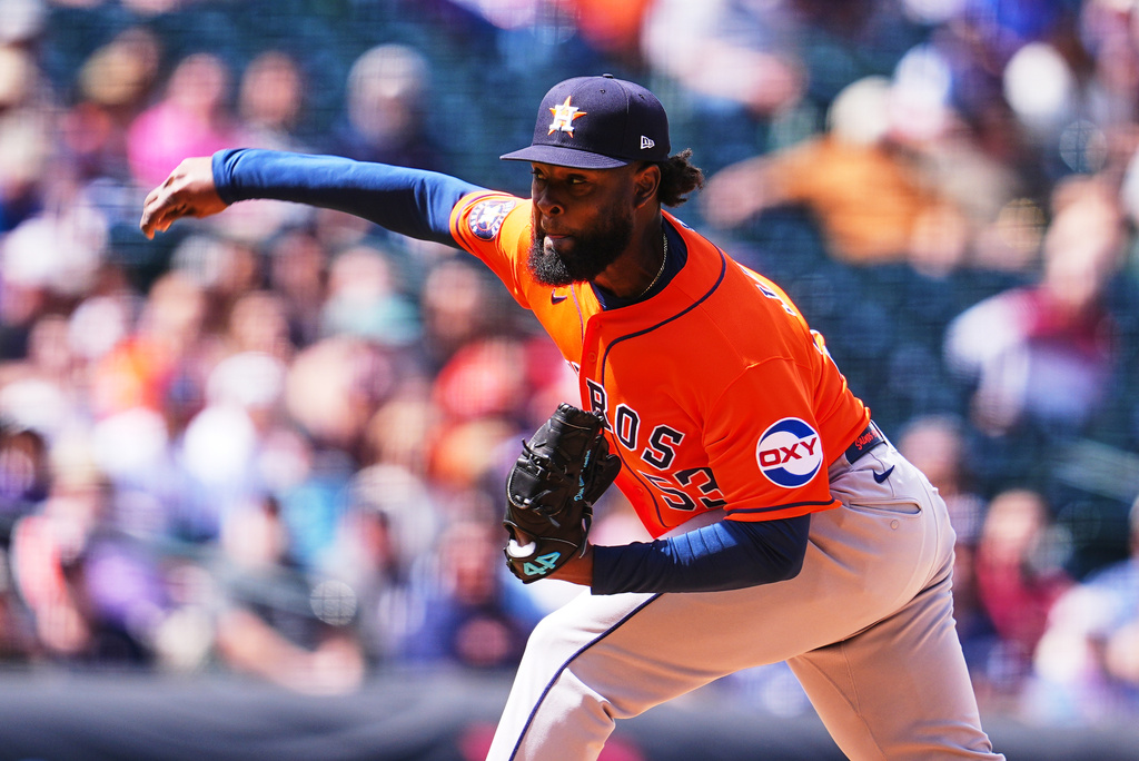 Houston Astros starting pitcher Cristian Javier works against the Colorado Rockies in the first inning of a baseball game Wednesday, April 8, 2026, in Denver. (AP Photo/David Zalubowski)