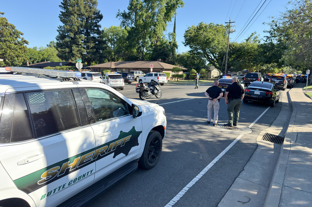 Law enforcement personnel block East First Avenue between Sherman Avenue and Sheridan Avenue following a shooting at the Chico Library, Monday, June 22, 2026 in Chico, Calif. (Michael Weber/The Chico Enterprise-Record via AP)