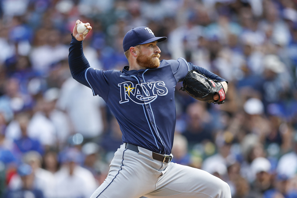 Tampa Bay Rays starting pitcher Drew Rasmussen (57) delivers a pitch against the Chicago Cubs during the second inning of a baseball game Saturday, Sept. 13, 2025, in Chicago. (AP Photo/Kamil Krzaczynski)