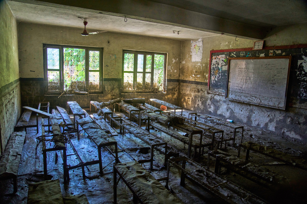 Mud covers a classroom at the Shree Bagheswori Madhyamik School, damaged in flash flooding in Galchhi, Dhading district of Nepal, Sunday, Aug. 30, 2026. (AP Photo/Niranjan Shrestha)