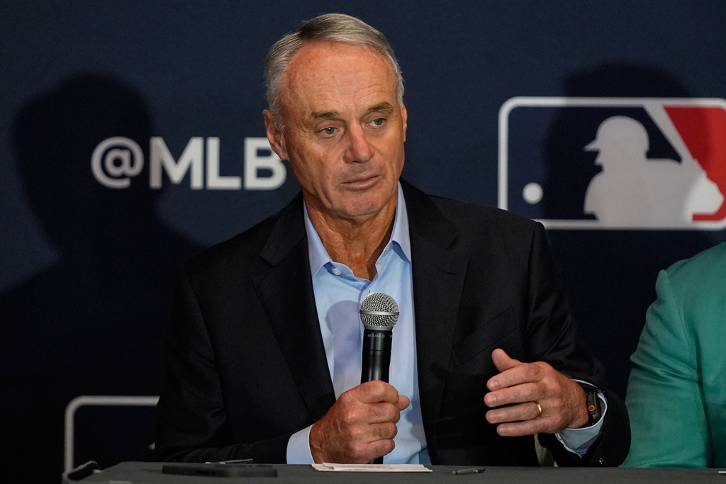 FILE - Rob Manfred, commissioner of Major League Baseball, answers questions during a news conference at the MLB winter meetings, Dec. 8, 2025, in Orlando, Fla. (AP Photo/John Raoux, File)