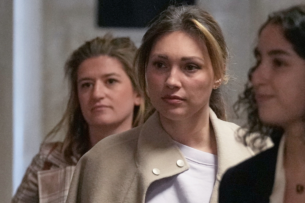 Jessica Mann, center, arrives for Harvey Weinstein's trial in criminal court in New York, Monday, April 27, 2026. (AP Photo/Richard Drew)