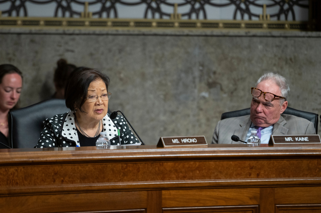 Sen. Mazie Hirono, D-Hawaii, left, questions a witness as Sen. Tim Kaine, D-Va., right, looks on during the Senate Committee on Armed Services hearing on Capitol Hill in Washington, Tuesday, April 28, 2026. (AP Photo/Cliff Owen)